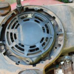 Picture of pull starter cover with location of fueltank screws