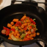 Vegetables stir fried in a cast iron skillet