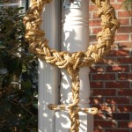 Picture of braided rope wreath with cross finish underneath